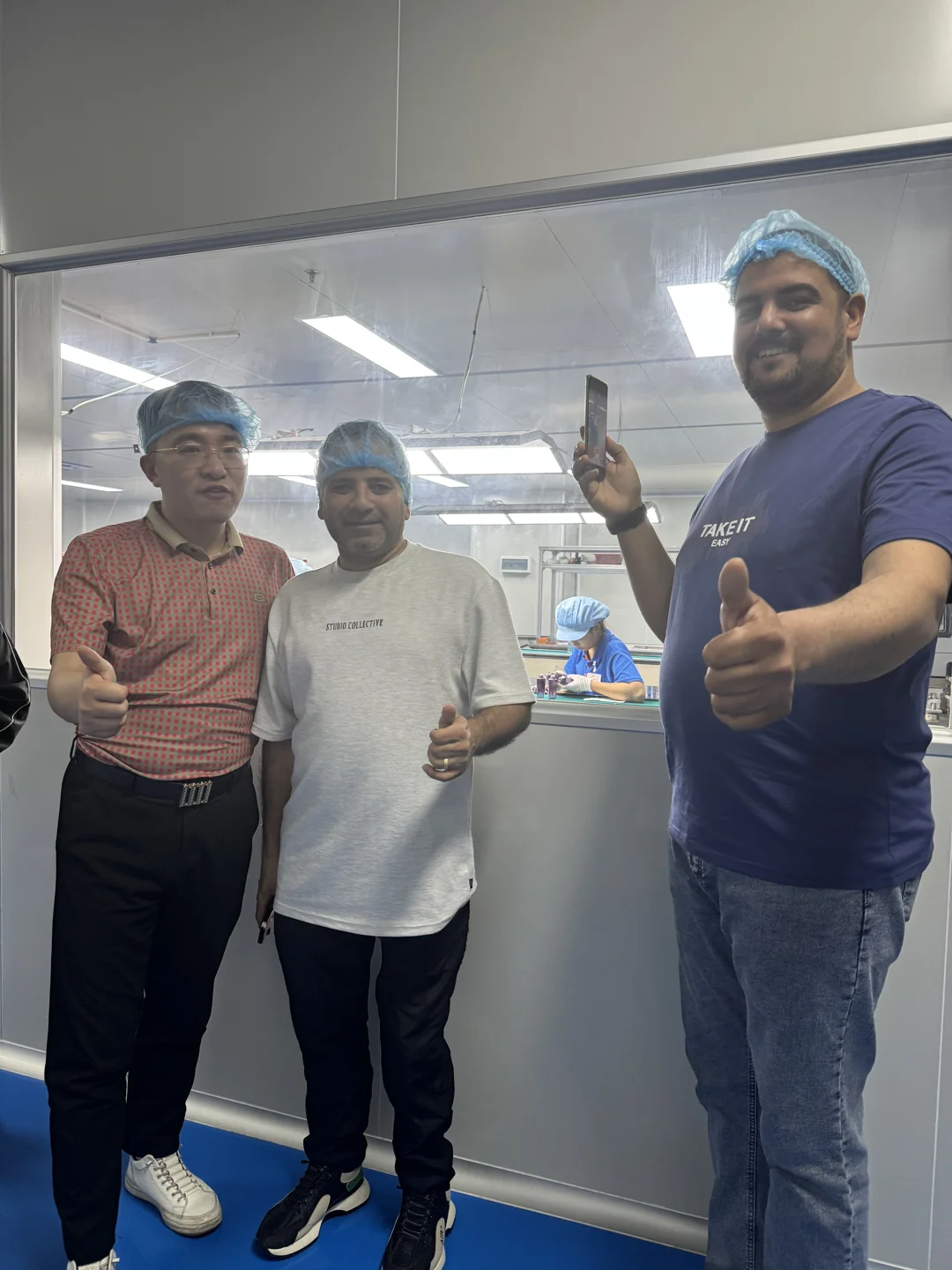 Customers and the PauPack team during a factory visit